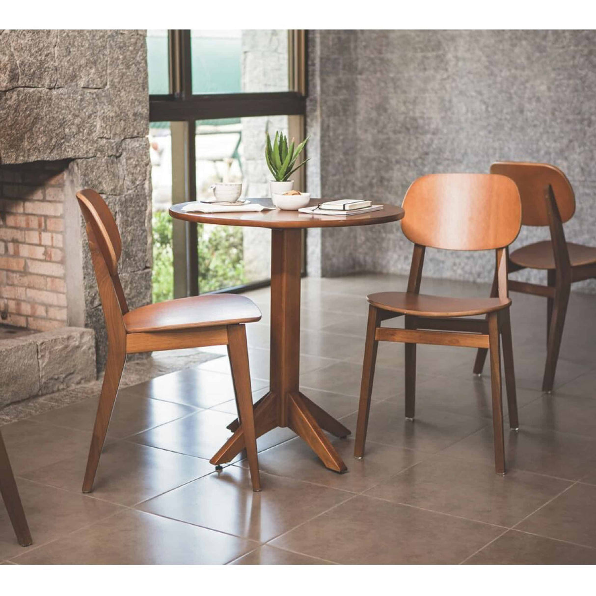 Tramontina London armless chair in almond-colored Tauari wood